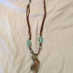 Teal and gold necklace with glass pendant